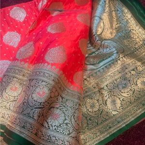 Elegant Red and Green Saree with Silver Detailing
